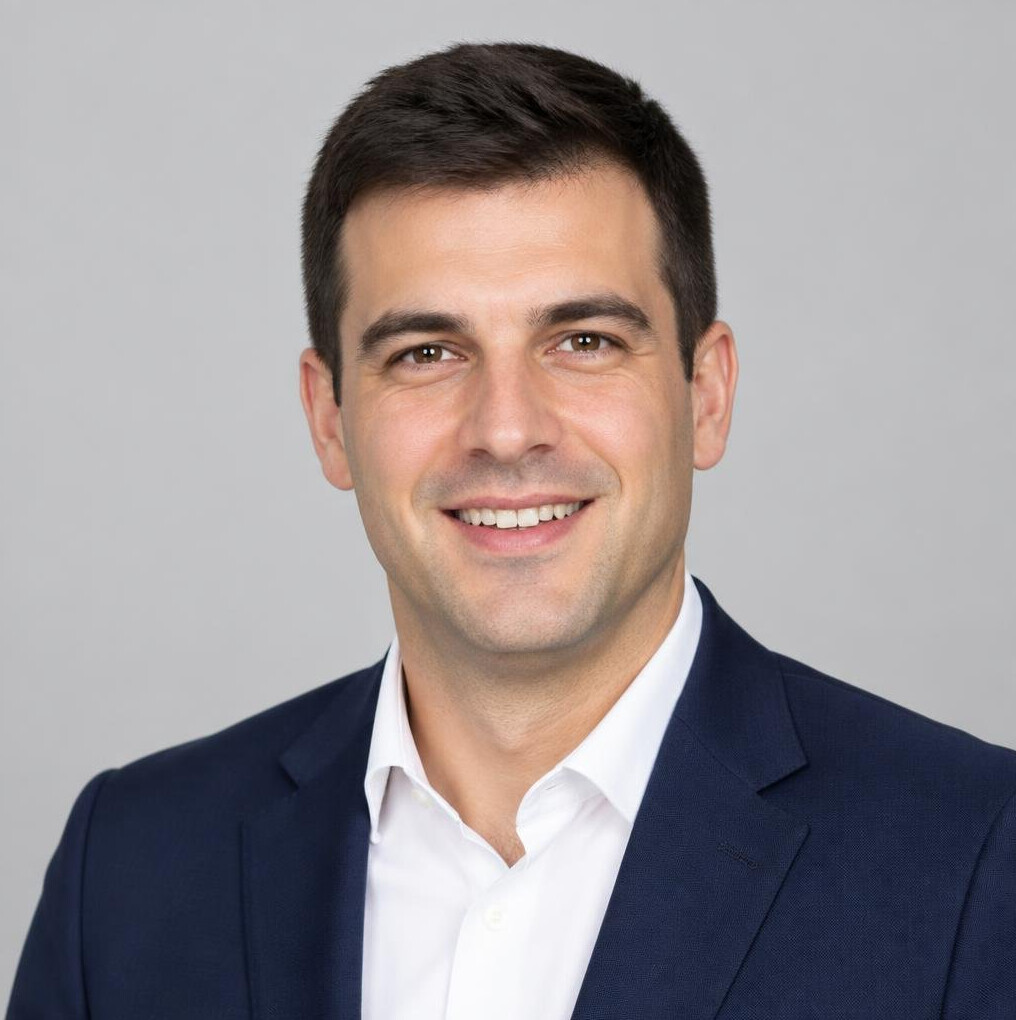 Studio portrait of a Croatian man with short dark hair