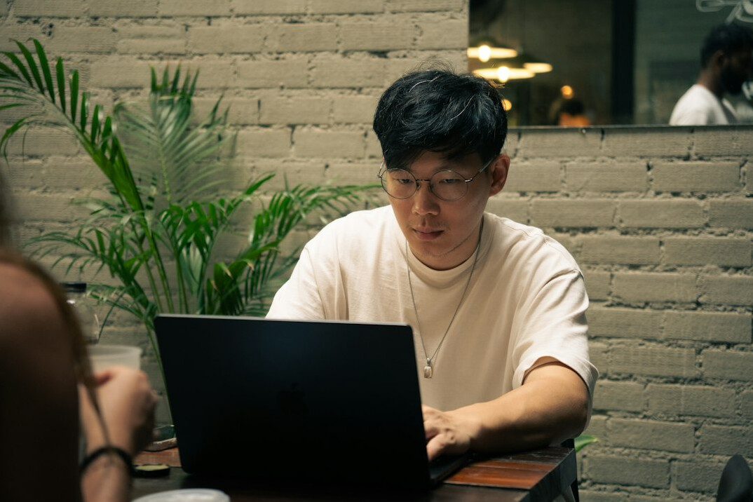 programmer working on laptop